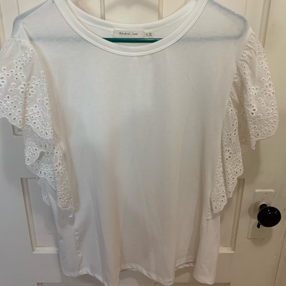 Great white tee with lace detail.